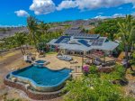 Perched on a hill with an sweeping ocean view, infinity pool, hot tub, BBQ area, gazebo and fire pit